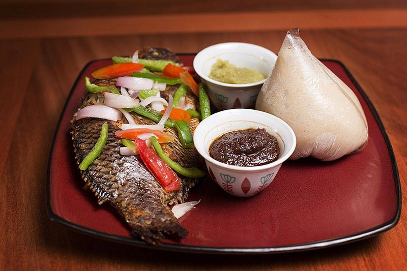 Banku with Tilapia » De Capital Hotels & Restaurant